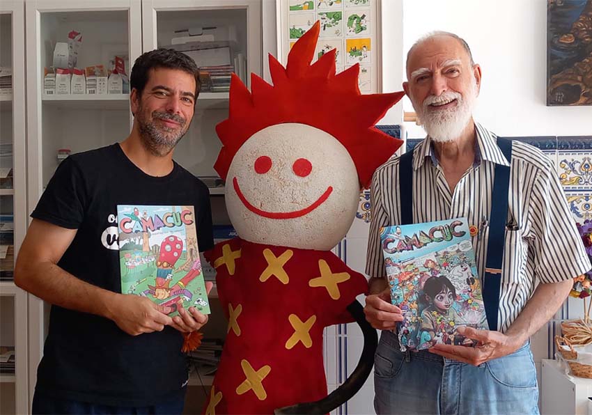 Dos hombre y en medio un muñeco